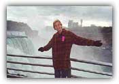 Becky stands in front of the impassable Niagara Falls