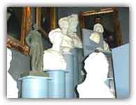 A collection of busts of Abe Lincoln