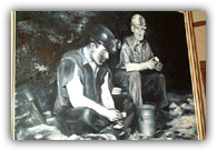Debs spent his entire life helping the working class, such as these miners depicted in a mural in his home's attic