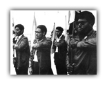 Black Panthers march to a California courthouse in support for Huey Newton