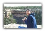 Neda eats a hearty vegetarian breakfast in front of the cliff dwellings at Mesa Verde